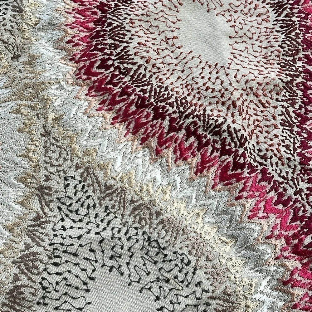 Beautiful embroidered fabric remnant quilts